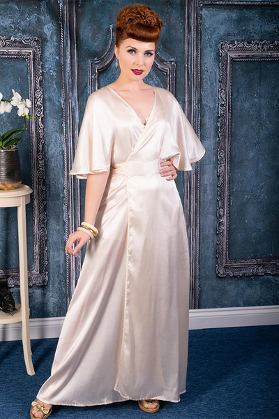 What Katie Did UK Vintage 1930s 1940s Satin wrap robe in a creamy peach color. Perfect old Hollywood glam look. Floor length soft silk. flowy sleeves. Curve hugging and flattering dressing gown. The proper Pinup